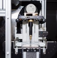 X-ray tube mounted on rotating gantry with collimator attached